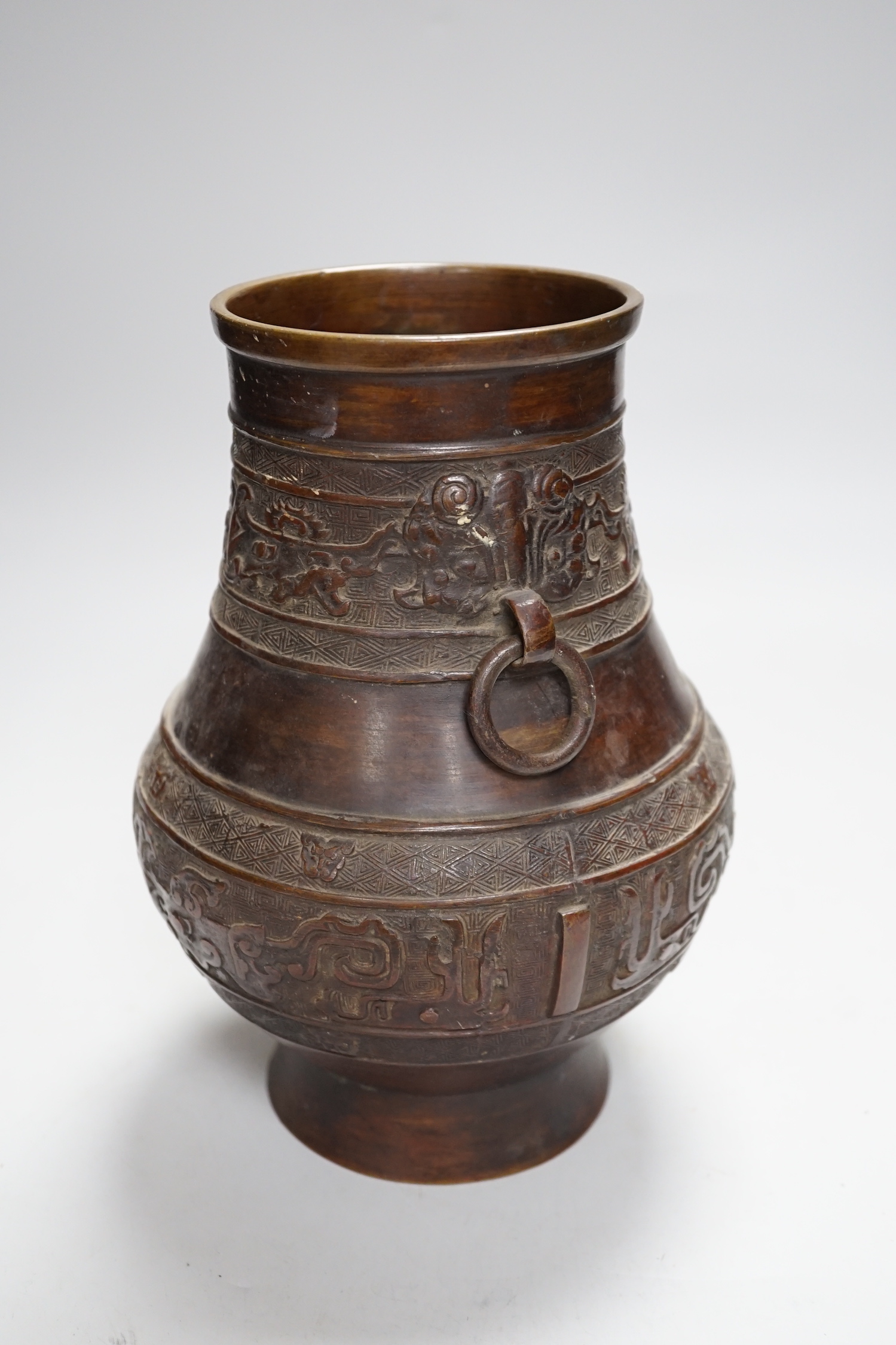 A Chinese archaistic bronze vase, hu, Xuande mark, 19th century, 24cm high